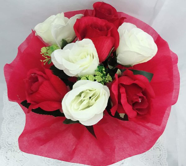 artificial red and white roses
