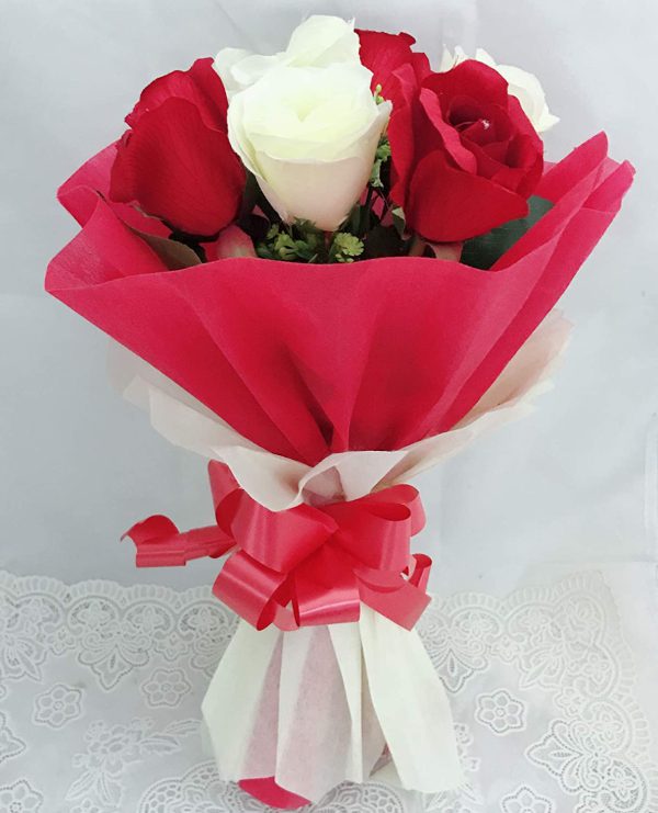 artificial red and white roses