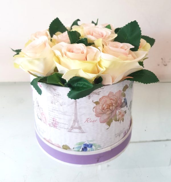 pink white artificial roses in box