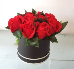 Artificial Red Roses in a Black Box